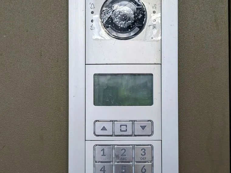 Video intercom door station at a commercial building entrance in Dubai